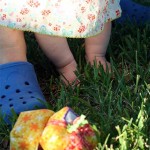 giftbox lil feet in the green grass